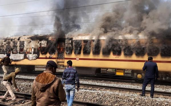 A mob set this train car afire as they protested railway jobs that set increasingly demanding requirements, shutting out many applicants. What the media called a "job riot" took place in Gaya in the northeast Indian state of Bihar on Jan. 26. A mob set this train car afire as they protested railway jobs that set increasingly demanding requirements, shutting out many applicants. What the media called a "job riot" took place in Gaya in the northeast Indian state of Bihar on Jan. 26.