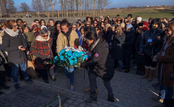 Members of a group of French women from diverse religious and ethnic backgrounds lay a wreath near the Auschwitz gas chambers earlier this month. After learning more about the horrors of the Holocaust, they hoped to bring greater understanding to their co Members of a group of French women from diverse religious and ethnic backgrounds lay a wreath near the Auschwitz gas chambers earlier this month. After learning more about the horrors of the Holocaust, they hoped to bring greater understanding to their co