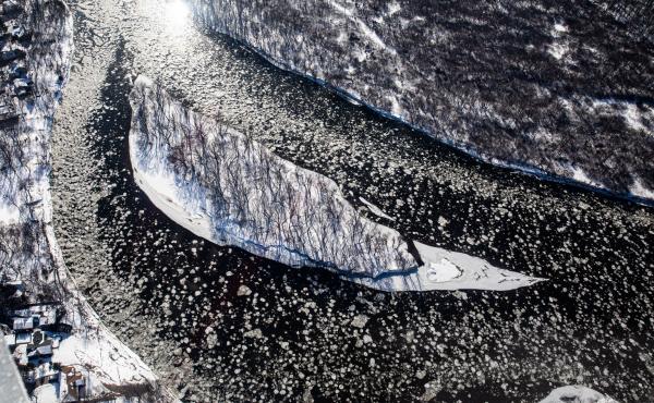 Ice flows around a small island in the Mississippi River near Dayton, Minn., on Feb. 13, 2020. Pilots take measurements to try and gauge how much water is in a snowpack. Ice flows around a small island in the Mississippi River near Dayton, Minn., on Feb. 13, 2020. Pilots take measurements to try and gauge how much water is in a snowpack.