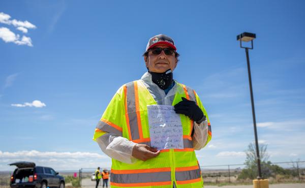Navajo Nation President Jonathan Nez holds a letter from a Navajo family while distributing food, water and other supplies on May 27, on the Navajo Nation Reservation in New Mexico. Navajo Nation President Jonathan Nez holds a letter from a Navajo family while distributing food, water and other supplies on May 27, on the Navajo Nation Reservation in New Mexico.