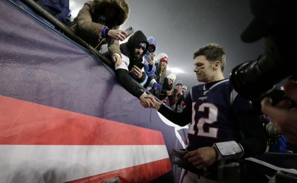 Tom Brady shakes hands with a fan as he leaves the field in Foxborough, Mass., after losing a playoff football game to the Tennessee Titans earlier this year. As it turns out, that was likely the final game the quarterback would play in a New England Patr Tom Brady shakes hands with a fan as he leaves the field in Foxborough, Mass., after losing a playoff football game to the Tennessee Titans earlier this year. As it turns out, that was likely the final game the quarterback would play in a New England Patr