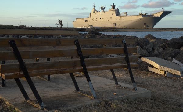 This photo shows the Australian Navy's HMAS Adelaide docked at Vuna Wharf in Tonga's capital Nukualofa on Jan. 26 to deliver aid following the Jan. 15 eruption of the nearby Hunga Tonga-Hunga Haapai underwater volcano. Tonga's deputy chief of mission in A This photo shows the Australian Navy's HMAS Adelaide docked at Vuna Wharf in Tonga's capital Nukualofa on Jan. 26 to deliver aid following the Jan. 15 eruption of the nearby Hunga Tonga-Hunga Haapai underwater volcano. Tonga's deputy chief of mission in A