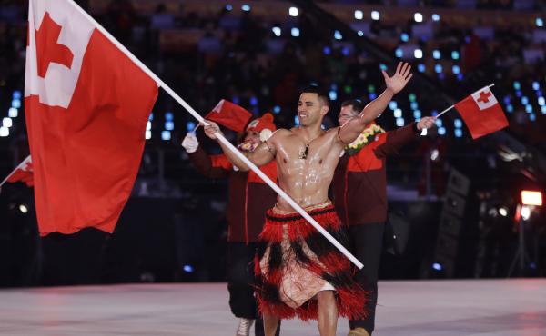 Pita Taufatofua makes an entrance during the opening ceremony of the 2018 Pyeongchang Winter Olympics. Taufatofua competed in taekwondo and cross-country skiing, but he's most famous for carrying the flag of Tonga for three consecutive Games, stealing the Pita Taufatofua makes an entrance during the opening ceremony of the 2018 Pyeongchang Winter Olympics. Taufatofua competed in taekwondo and cross-country skiing, but he's most famous for carrying the flag of Tonga for three consecutive Games, stealing the