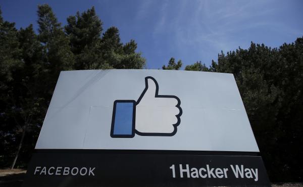 Facebook's thumbs-up "Like" logo is shown on a sign at the company's headquarters in Menlo Park, Calif. Facebook's thumbs-up "Like" logo is shown on a sign at the company's headquarters in Menlo Park, Calif.