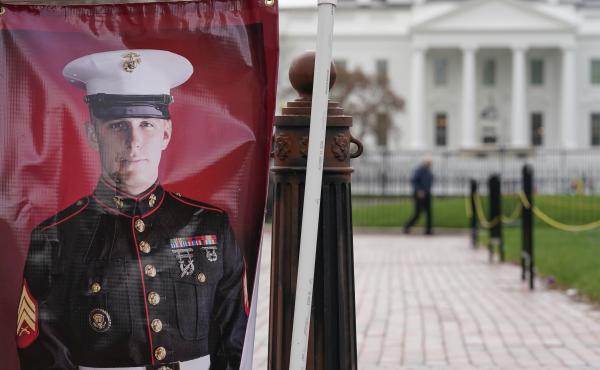 A poster photo of U.S. Marine Corps veteran and Russian prisoner Trevor Reed is hung in Lafayette Park near the White House on Wednesday. A poster photo of U.S. Marine Corps veteran and Russian prisoner Trevor Reed is hung in Lafayette Park near the White House on Wednesday.