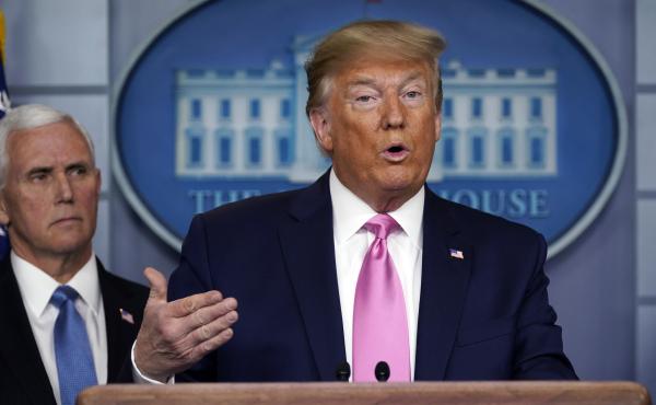 President Trump speaks as Vice President Pence listens during a Wednesday news conference about the U.S. response to the new coronavirus. President Trump speaks as Vice President Pence listens during a Wednesday news conference about the U.S. response to the new coronavirus.