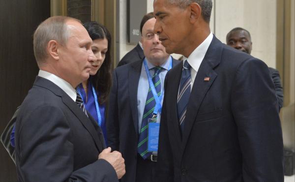 Russian President Vladimir Putin, left, speaks with then- U.S. President Barack Obama in Hangzhou in eastern China's Zhejiang province on Sept. 5, 2016, in the midst of last year's presidential race. Russian President Vladimir Putin, left, speaks with then- U.S. President Barack Obama in Hangzhou in eastern China's Zhejiang province on Sept. 5, 2016, in the midst of last year's presidential race.