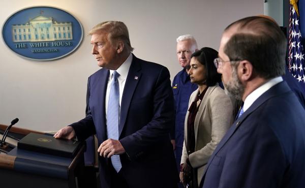 President Trump arrives to speak at a news briefing with the coronavirus task force on Monday in the White House press briefing room. President Trump arrives to speak at a news briefing with the coronavirus task force on Monday in the White House press briefing room.