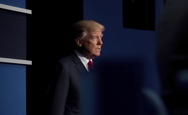 Then-candidate Donald Trump walks onstage at a presidential debate in St. Louis two days after a video was released, in which he is heard talking to Access Hollywood host Billy Bush about sexually assaulting women. Then-candidate Donald Trump walks onstage at a presidential debate in St. Louis two days after a video was released, in which he is heard talking to Access Hollywood host Billy Bush about sexually assaulting women.