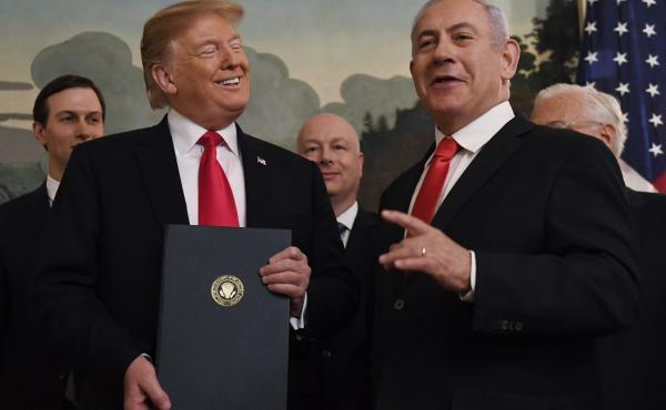 President Trump stands with Israeli Prime Minister Benjamin Netanyahu during a ceremony to sign a proclamation recognizing Israel's sovereignty over the Golan Heights, on Monday. President Trump stands with Israeli Prime Minister Benjamin Netanyahu during a ceremony to sign a proclamation recognizing Israel's sovereignty over the Golan Heights, on Monday.