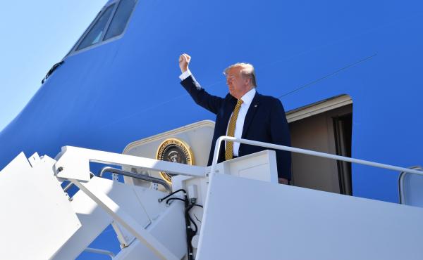 President Trump waves before boarding Air Force One as he departs Albuquerque, N.M., en route to campaign events in California on Tuesday. President Trump waves before boarding Air Force One as he departs Albuquerque, N.M., en route to campaign events in California on Tuesday.