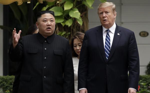 President Trump and North Korean leader Kim Jong Un take a walk during their meeting in Hanoi, Vietnam, on Thursday. President Trump and North Korean leader Kim Jong Un take a walk during their meeting in Hanoi, Vietnam, on Thursday.