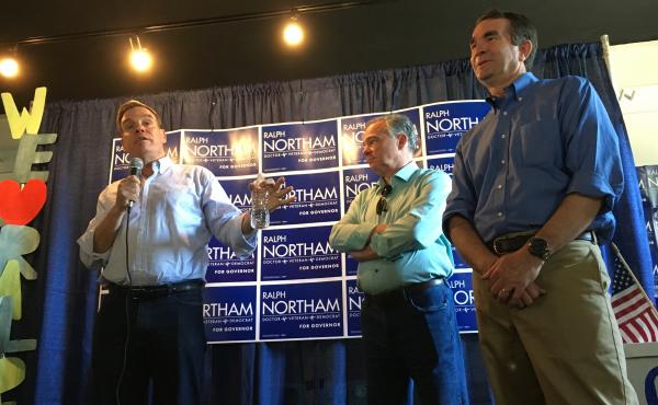 Virginia Sens. Mark Warner and Tim Kaine campaign for Lt. Gov. Ralph Northam for governor during a canvass kickoff on Saturday in Arlington, Va. Virginia Sens. Mark Warner and Tim Kaine campaign for Lt. Gov. Ralph Northam for governor during a canvass kickoff on Saturday in Arlington, Va.