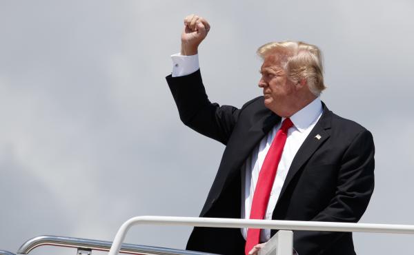 President Trump boards Air Force One, Thursday, en route to Montana. President Trump boards Air Force One, Thursday, en route to Montana.