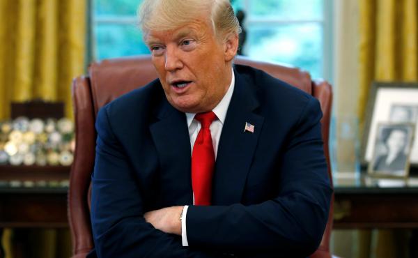 President Trump answers a question during a Reuters interview in the Oval Office on Monday. The president again criticized the Fed for raising interest rates. President Trump answers a question during a Reuters interview in the Oval Office on Monday. The president again criticized the Fed for raising interest rates.