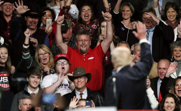 President-elect Donald Trump waves to supporters during a rally Thursday in Des Moines, Iowa. President-elect Donald Trump waves to supporters during a rally Thursday in Des Moines, Iowa.