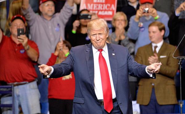President-elect Donald Trump points to his supporters during his "Thank You" rally in Fayetteville, N.C., on Tuesday night. President-elect Donald Trump points to his supporters during his "Thank You" rally in Fayetteville, N.C., on Tuesday night.