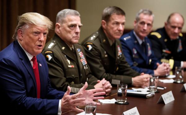 Army Gen. Mark Milley (second from left), chairman of the Joint Chiefs of Staff, and others listen as President Trump speaks during a meeting with senior military leaders in October. Army Gen. Mark Milley (second from left), chairman of the Joint Chiefs of Staff, and others listen as President Trump speaks during a meeting with senior military leaders in October.