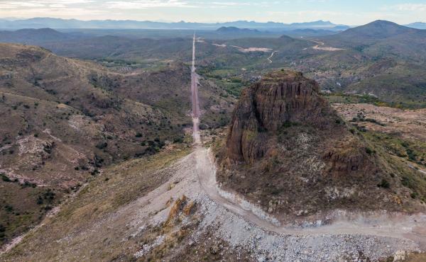 In the Guadalupe Canyon in southeastern Arizona, work crews are dynamiting mountainsides and bulldozing access roads in this stunning landscape to make way for the border wall. Mexico is on the left. In the Guadalupe Canyon in southeastern Arizona, work crews are dynamiting mountainsides and bulldozing access roads in this stunning landscape to make way for the border wall. Mexico is on the left.