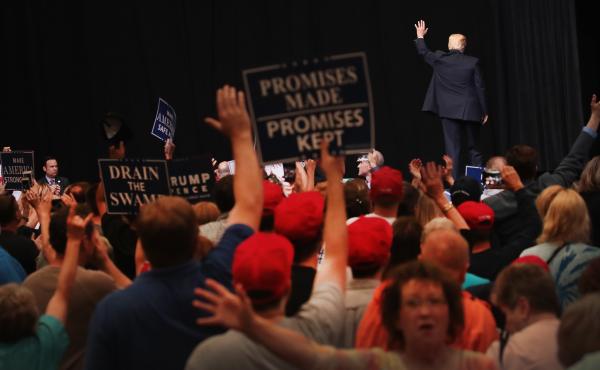 President Donald Trump leaves the stage following a rally on June 21, 2017 in Cedar Rapids, Iowa. President Donald Trump leaves the stage following a rally on June 21, 2017 in Cedar Rapids, Iowa.