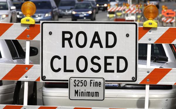 A road repair blocks traffic in Springfield, Ill. as Congress tries to decide how to pay for President Trump's ambitious spending plan to rebuild roads, bridges, railroads and airports. A road repair blocks traffic in Springfield, Ill. as Congress tries to decide how to pay for President Trump's ambitious spending plan to rebuild roads, bridges, railroads and airports.