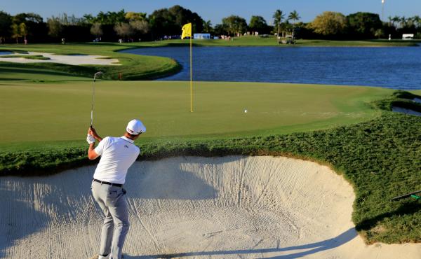 Adam Scott of Australia plays during the World Golf Championships-Cadillac Championship at the Trump National Doral Blue Monster course in 2016. Adam Scott of Australia plays during the World Golf Championships-Cadillac Championship at the Trump National Doral Blue Monster course in 2016.