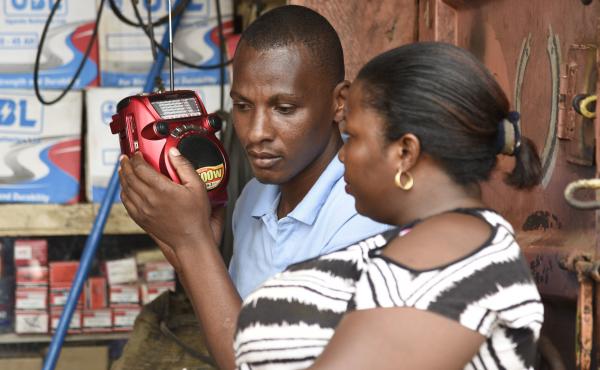 People listen to the radio as the results of the presidential elections are announced in Kireka, Uganda, in February. Many rural Ugandans don't have Internet access, and the radio is a central source of news — and platform for citizens' opinions. People listen to the radio as the results of the presidential elections are announced in Kireka, Uganda, in February. Many rural Ugandans don't have Internet access, and the radio is a central source of news — and platform for citizens' opinions.