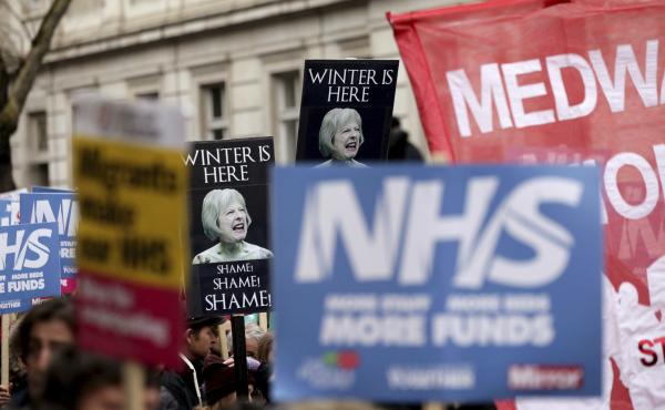 Protesters marched in London on Feb. 3 to demand more money for Britain's National Health Service, as winter conditions are thought to have put a severe strain on the system. Protesters marched in London on Feb. 3 to demand more money for Britain's National Health Service, as winter conditions are thought to have put a severe strain on the system.
