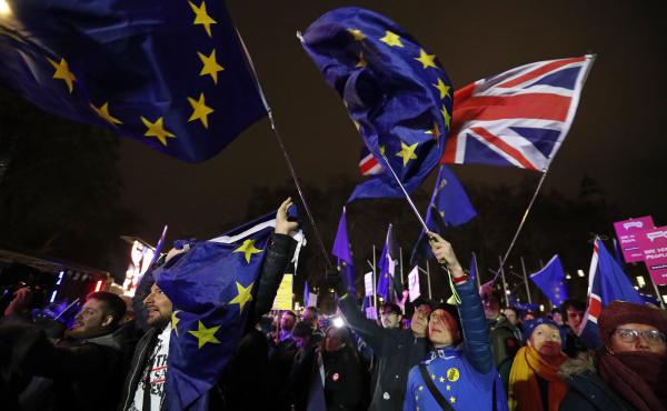Anti-Brexit demonstrators react after the results of the vote on British Prime Minister Theresa May's Brexit deal were announced in Parliament square in London on Tuesday. British lawmakers have rejected Prime Minister Theresa May's Brexit deal by a huge Anti-Brexit demonstrators react after the results of the vote on British Prime Minister Theresa May's Brexit deal were announced in Parliament square in London on Tuesday. British lawmakers have rejected Prime Minister Theresa May's Brexit deal by a huge