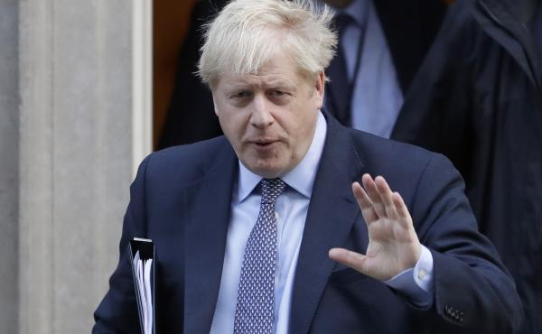 British Prime Minister Boris Johnson leaves No. 10 Downing St. to go to the Houses of Parliament in London on Saturday. British Prime Minister Boris Johnson leaves No. 10 Downing St. to go to the Houses of Parliament in London on Saturday.