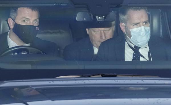 Britain's Prime Minister Boris Johnson, center, sits in a car as he leaves Parliament after attending the weekly Prime Ministers' Questions session in London, Wednesday, Jan. 12, 2022. Britain's Prime Minister Boris Johnson, center, sits in a car as he leaves Parliament after attending the weekly Prime Ministers' Questions session in London, Wednesday, Jan. 12, 2022.