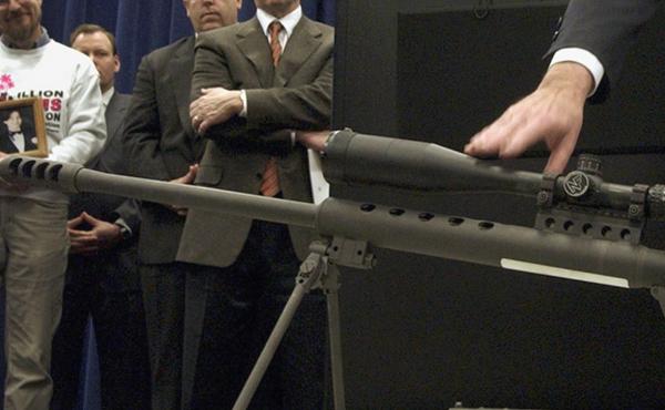 Local officials point to a .50-caliber assault weapon during a 2005 news conference in Chicago, a year before Cook County officials enacted an assault weapons ban. The law has been upheld by trial and appeals courts. On Thursday, a federal appeals court a Local officials point to a .50-caliber assault weapon during a 2005 news conference in Chicago, a year before Cook County officials enacted an assault weapons ban. The law has been upheld by trial and appeals courts. On Thursday, a federal appeals court a