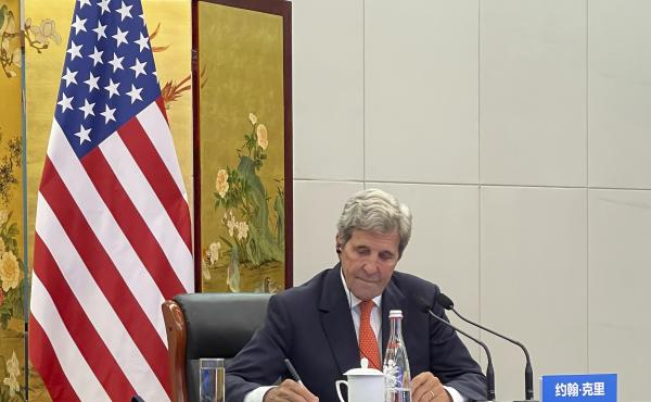 In this photo provided by the U.S. Department of State, U.S. Special Presidential Envoy for Climate John Kerry attends a meeting with Chinese Foreign Minister Wang Yi via video link in Tianjin, China, Wednesday, Sept. 1, 2021. Wang warned Kerry on Wednesd In this photo provided by the U.S. Department of State, U.S. Special Presidential Envoy for Climate John Kerry attends a meeting with Chinese Foreign Minister Wang Yi via video link in Tianjin, China, Wednesday, Sept. 1, 2021. Wang warned Kerry on Wednesd