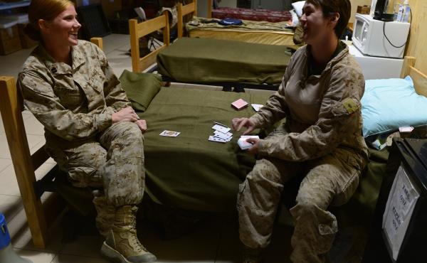 Marines play a game of cards as British and U.S. troops prepare to leave the Camp Bastion-Leatherneck complex at Lashkar Gah in Afghanistan's Helmand province. The base was formally handed over to an Afghan force Sunday. Marines play a game of cards as British and U.S. troops prepare to leave the Camp Bastion-Leatherneck complex at Lashkar Gah in Afghanistan's Helmand province. The base was formally handed over to an Afghan force Sunday.