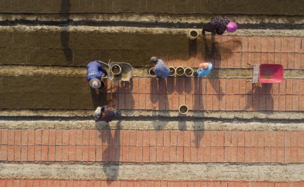 The new U.S. tariffs list includes staples such as rice, along with clocks, watches and other items that weren't previously under threat of new duties. Here, farmers plant rice seeds at a seedlings pool in China's Jiangsu province. The new U.S. tariffs list includes staples such as rice, along with clocks, watches and other items that weren't previously under threat of new duties. Here, farmers plant rice seeds at a seedlings pool in China's Jiangsu province.