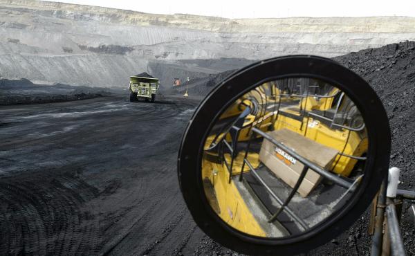 A coal-hauling truck with 240 tons of coal drives to the surface at the Buckskin Coal Mine in Gillette, Wyo., in 2004. A coal-hauling truck with 240 tons of coal drives to the surface at the Buckskin Coal Mine in Gillette, Wyo., in 2004.