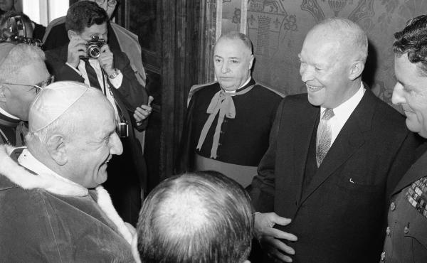 Pope John XXIII with President Dwight D. Eisenhower, who stands at left, during an audience granted in the pontiff's private library in the Vatican Palace on Dec. 6, 1959. Eisenhower was the second U.S. president to meet the pope. Pope John XXIII with President Dwight D. Eisenhower, who stands at left, during an audience granted in the pontiff's private library in the Vatican Palace on Dec. 6, 1959. Eisenhower was the second U.S. president to meet the pope.