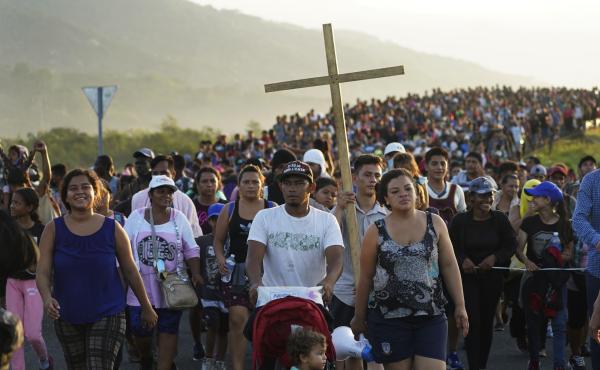Migrants leave Huixtla, Chiapas state, Mexico, on Oct. 27 as they continue their trek north toward Mexico's northern states and the U.S. border. Migrants leave Huixtla, Chiapas state, Mexico, on Oct. 27 as they continue their trek north toward Mexico's northern states and the U.S. border.