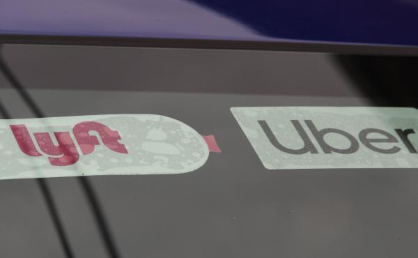 Ride-share companies Lyft and Uber announced they will add a temporary surcharge on their rides to help their drivers deal with the rise in gas prices. Ride-share companies Lyft and Uber announced they will add a temporary surcharge on their rides to help their drivers deal with the rise in gas prices.