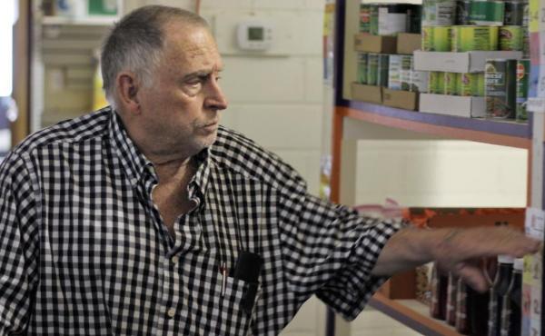 Leroy Bates shops at the Rising Up food pantry in Fort Morgan, Colo. Clients can visit it 13 times a year. Leroy Bates shops at the Rising Up food pantry in Fort Morgan, Colo. Clients can visit it 13 times a year.