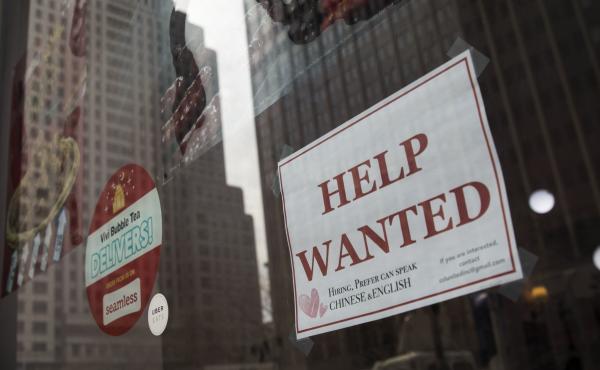 A "help wanted" sign hangs on a window of a restaurant in New York City. The U.S. economy gained a stronger-than-expected 223,000 jobs last month and the unemployment rate edged down to an 18-year low. A "help wanted" sign hangs on a window of a restaurant in New York City. The U.S. economy gained a stronger-than-expected 223,000 jobs last month and the unemployment rate edged down to an 18-year low.