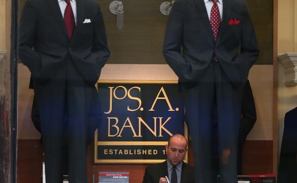An employee works inside a Jos. A. Bank retail store in San Francisco. The parent company Tailored Brands earlier said it would close up to 500 stores and cut 20% of corporate jobs. An employee works inside a Jos. A. Bank retail store in San Francisco. The parent company Tailored Brands earlier said it would close up to 500 stores and cut 20% of corporate jobs.