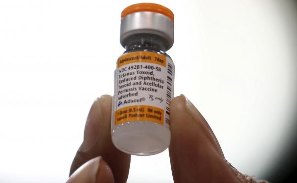 A nurse holds a tetanus, diphtheria and whooping cough vaccine in 2016. Physician Judith Guzman-Cottrill tells NPR that she has met many families who hesitate to give their children vaccines. A nurse holds a tetanus, diphtheria and whooping cough vaccine in 2016. Physician Judith Guzman-Cottrill tells NPR that she has met many families who hesitate to give their children vaccines.