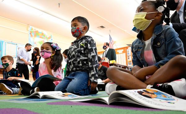 First-graders listen to the interim superintendent of the Los Angeles Unified School District, Megan Reilly, read a book at Normont Elementary School in Harbor City on Aug. 16, the first day of school. First-graders listen to the interim superintendent of the Los Angeles Unified School District, Megan Reilly, read a book at Normont Elementary School in Harbor City on Aug. 16, the first day of school.