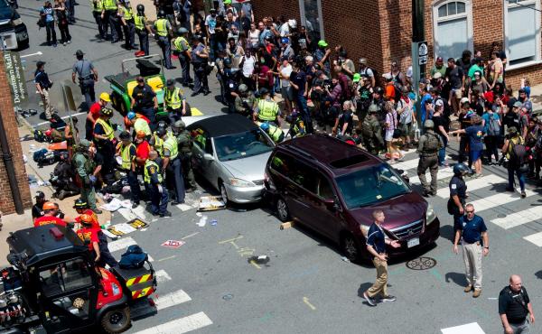 People receive first-aid after a car ran into a crowd of protesters in Charlottesville, Va. on August 12, 2017. Terrorism researchers say right-wing extremists are turning cars into weapons in response to the ongoing protests against police misconduct. People receive first-aid after a car ran into a crowd of protesters in Charlottesville, Va. on August 12, 2017. Terrorism researchers say right-wing extremists are turning cars into weapons in response to the ongoing protests against police misconduct.