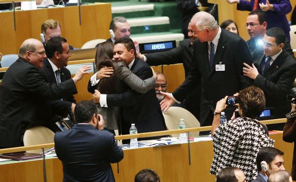 U.N. representatives for Venezuela, including Foreign Minister Rafael Ramirez, right, celebrate after being elected to a two year term as a non-permanent member of the United Nations Security Council on Thursday. U.N. representatives for Venezuela, including Foreign Minister Rafael Ramirez, right, celebrate after being elected to a two year term as a non-permanent member of the United Nations Security Council on Thursday.