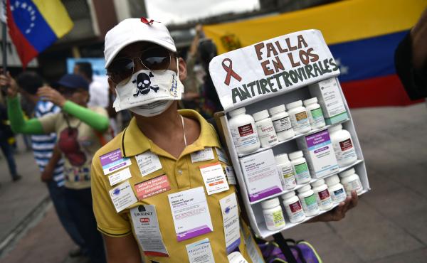 HIV-positive patients and their families protest hospitals' lack of medicines and supplies in Caracas, Venezuela, in April 2018. Some patients are fleeing to neighboring countries like Peru in search of lifesaving anti-retroviral drugs. HIV-positive patients and their families protest hospitals' lack of medicines and supplies in Caracas, Venezuela, in April 2018. Some patients are fleeing to neighboring countries like Peru in search of lifesaving anti-retroviral drugs.