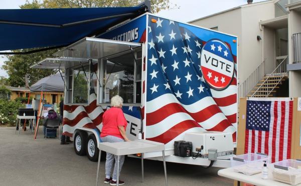 A new mobile voting center brings voting directly to residents in Santa Cruz County, Calif. Here, the VoteMobile is parked at Garfield Park Village, an apartment complex for seniors. A new mobile voting center brings voting directly to residents in Santa Cruz County, Calif. Here, the VoteMobile is parked at Garfield Park Village, an apartment complex for seniors.