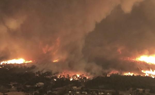 This still frame from a video released earlier this week by Cal Fire shows the "fire tornado" forming over Lake Keswick Estates near Redding, Calif., on July 26. This still frame from a video released earlier this week by Cal Fire shows the "fire tornado" forming over Lake Keswick Estates near Redding, Calif., on July 26.