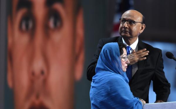 Khizr Khan, father of Humayun Khan, who was killed while serving in Iraq with the U.S. Army, gestures as his wife looks on during the final evening of the Democratic National Convention. Khizr Khan, father of Humayun Khan, who was killed while serving in Iraq with the U.S. Army, gestures as his wife looks on during the final evening of the Democratic National Convention.
